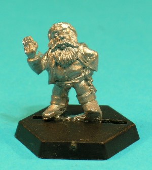 Pose 2. This figure stands with his right hand raised as if in greeting or warning. His left hand holds a large ring with keys hanging from it. His slotta-tab is marked 'Gatewarden'.