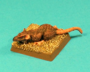 Figure 3, Giant Rat I.<br>The first of two Giant Rat miniatures in the set, this one looks like it's warily creeping forwards. See ADD61 for more Giant Rats.